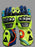 Pair of colorful motorcycle gloves with brand logo on a light gray background