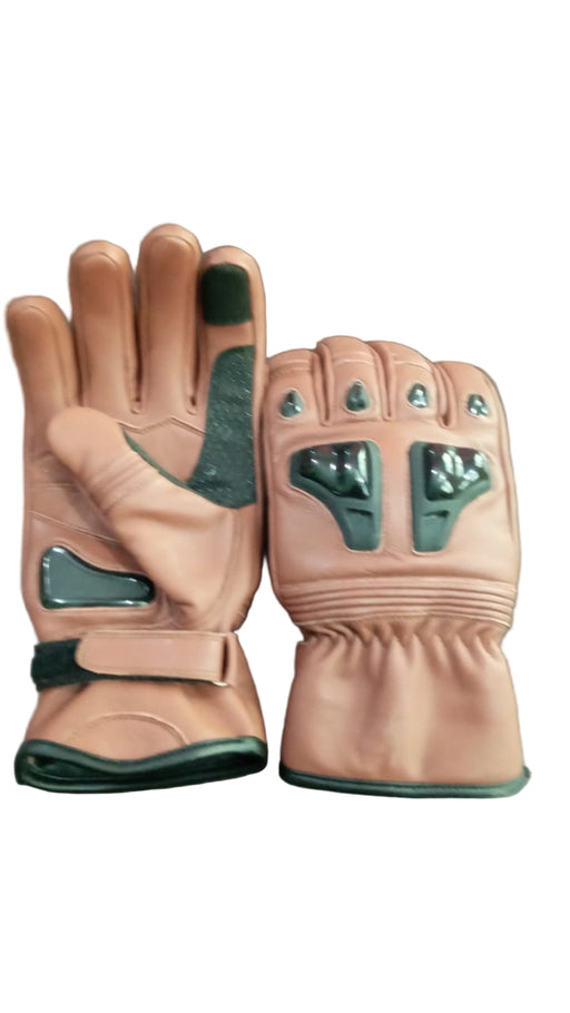 Pair of tan leather gloves with black accents on a wooden surface